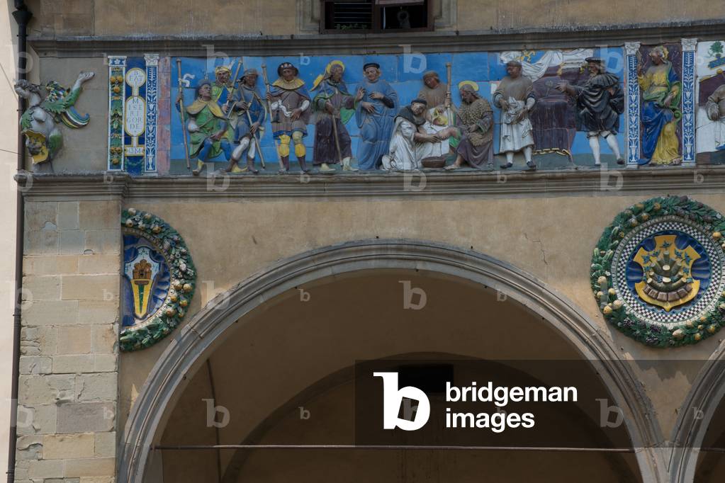 Facade of the Ospedale del Ceppo, Pistoia, showing frieze by Giovanni della Robbia and Santi Buglioni (photo)