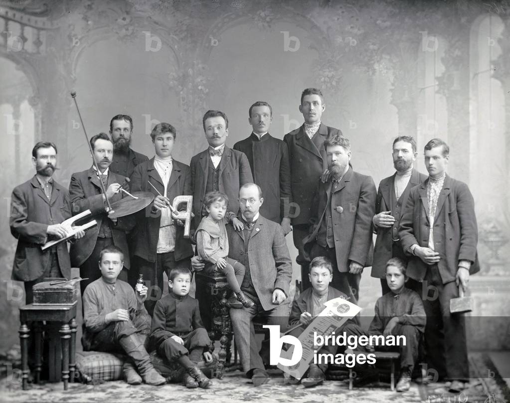 Workers at the photolaboratory of P. Zhukov and K. Shapiro - masters and apprentices, 1906 (b/w photo)