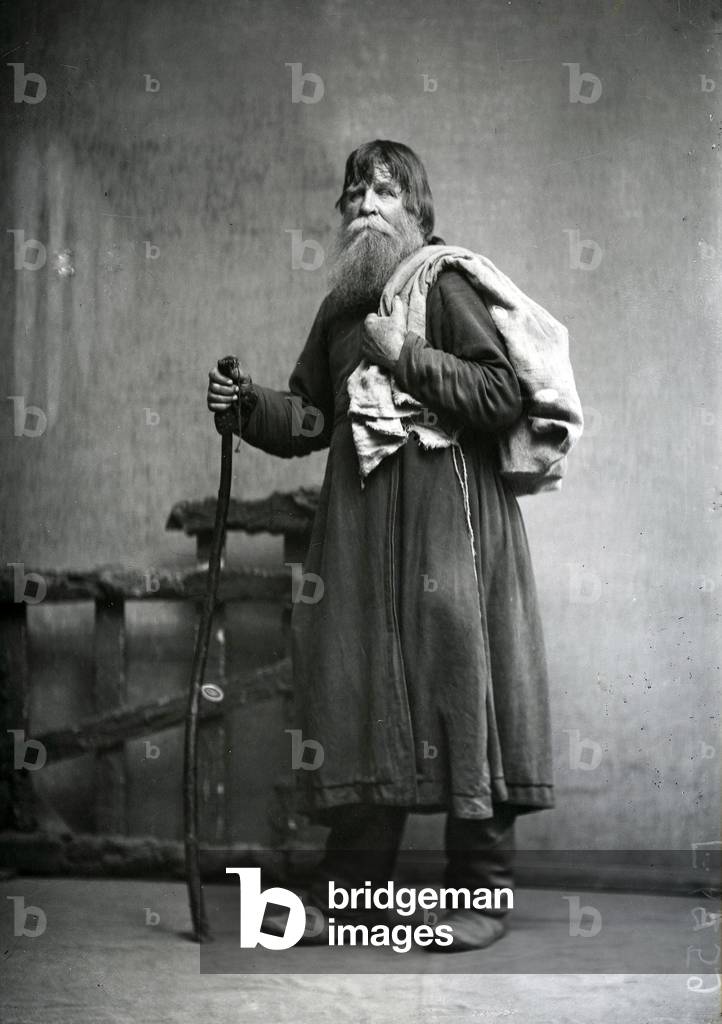 Postcard of a peasant with his staff (b/w photo)