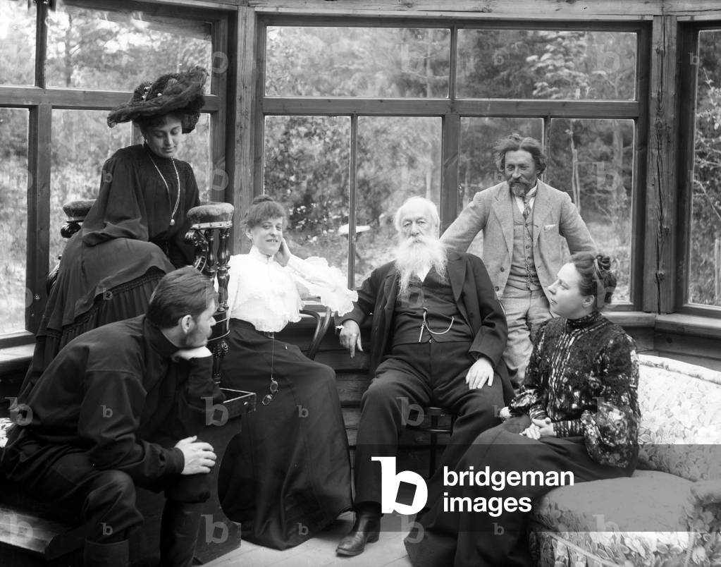 Vladimir Stasov resting after a sitting with Ilya Repin, with Natalya Nordman-Severova, Maxim Gorky and Maria Andreyeva, at Repin's dacha, August 1904 (b/w photo)