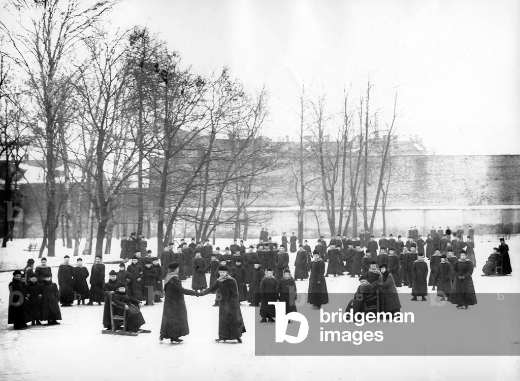 Pupils of the Mariinsky Institute skating on a frozen lake (b/w photo)