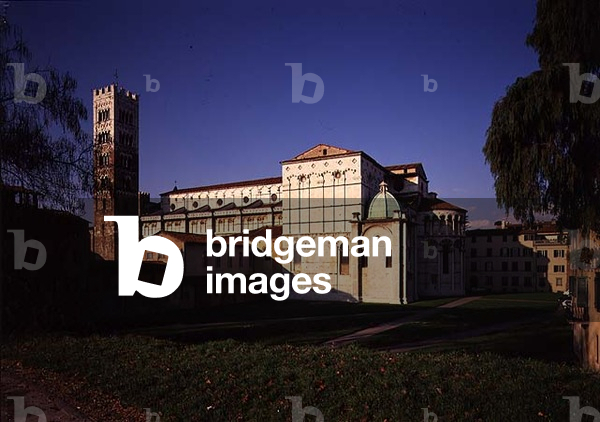 Exterior view of the church with the campanile, partly designed by Guidetto da Como (fl.1244-57) (photo)