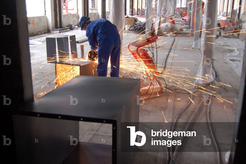 4124N Construction site of reconstruction of the former Imprimerie Nationale weldeur a l arc 27 rue de la Convention in Paris 19 January 2007