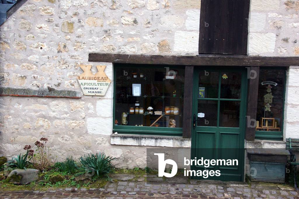 The village of CRISSAY on MANSE in Tourraine One of the beautiful villages of France typical Gingerbread Shop honey March 2008