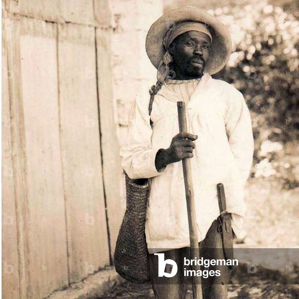 Worker in Haiti (b/w photo)