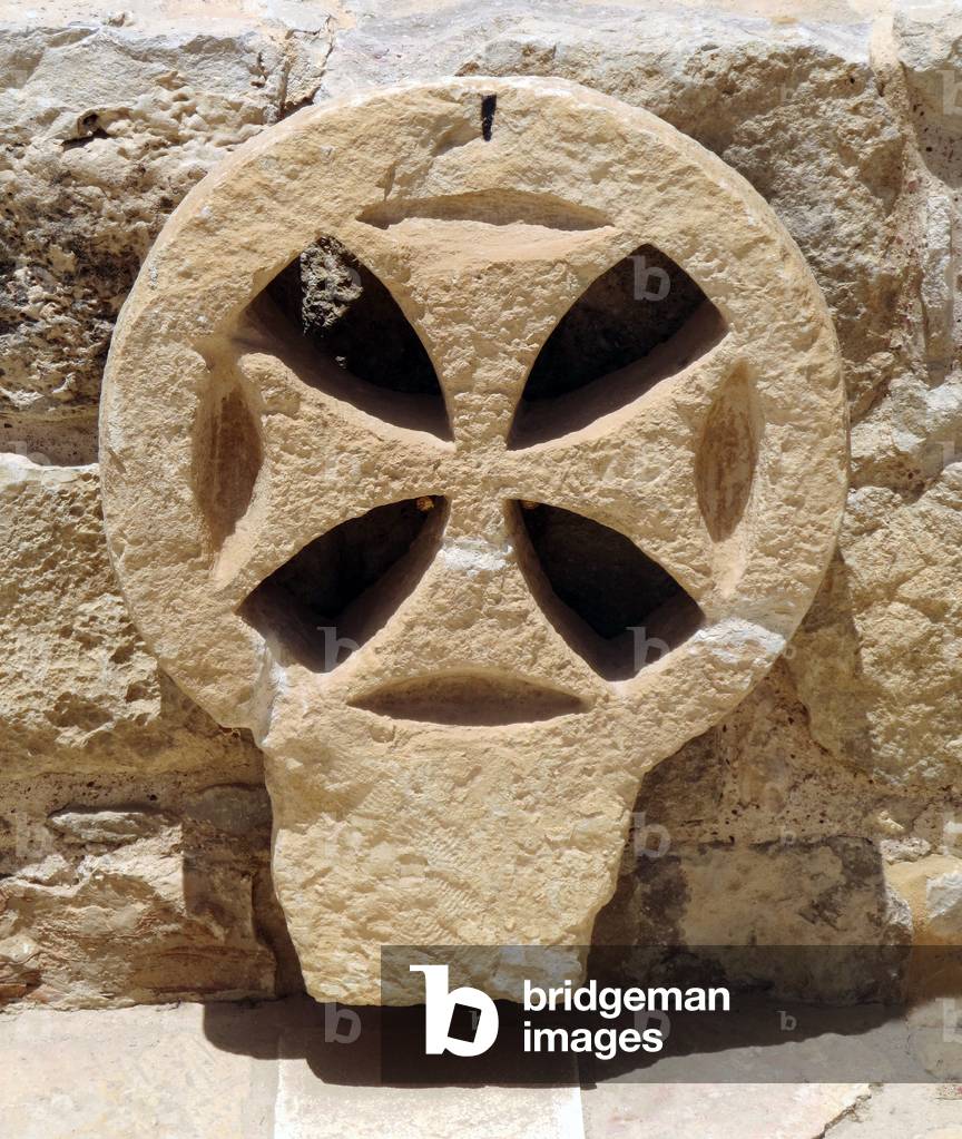 Architectural window detail from a Byzantine church in the Judea and Samaria area, West Bank (stone)