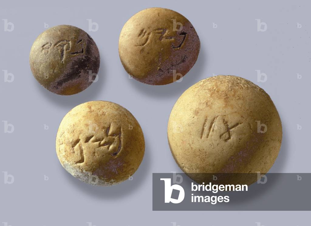 Weights, inscribed with their weight in shekels, from Jerusalem (stone)