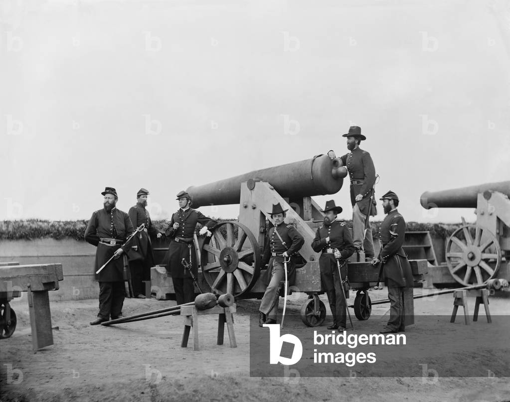 Officers posing with a heavy gun outside Washington, D. C., ca. 1862 (b/w photo)