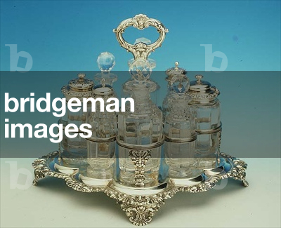 George IV eight bottle cruet, London 1829 (silver and glass)