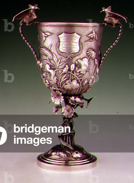 Chinese export presentation cup with embossed decoration of exotic birds and insects, made by Wang Hing (fl.1870-1930) 1888 (silver)