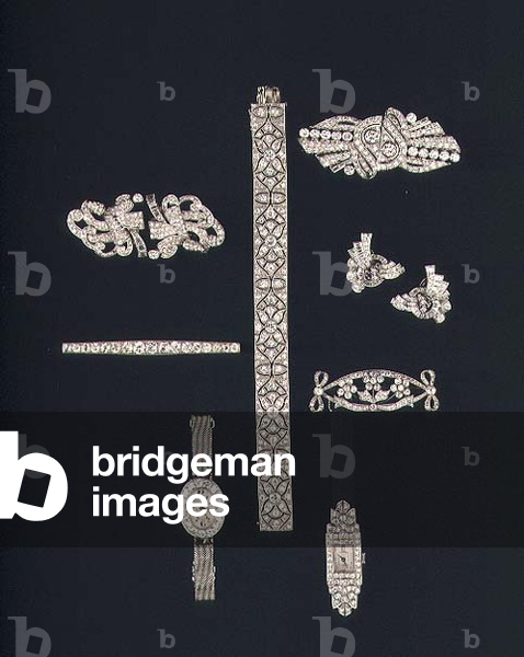 Selection of diamond jewellery: bracelet; Lady's oval wrist watch; double clip earrings; Lady's oblong wrist watch