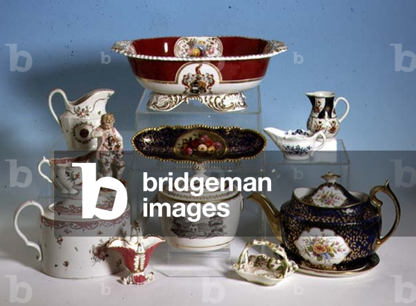 Selection of English porcelain: Chamberlain's Worcester armorial footed bowl, c.1820; Wedgwood three colour jasper teacup and saucer; Worcester Flight Barr and Barr pen tray; Plymouth figure of French shepherd; two New Hall jugs; Minton teapot; Rockingham basket; Delftware butter dish and lid; New Hall teapot and cover (porcelain)