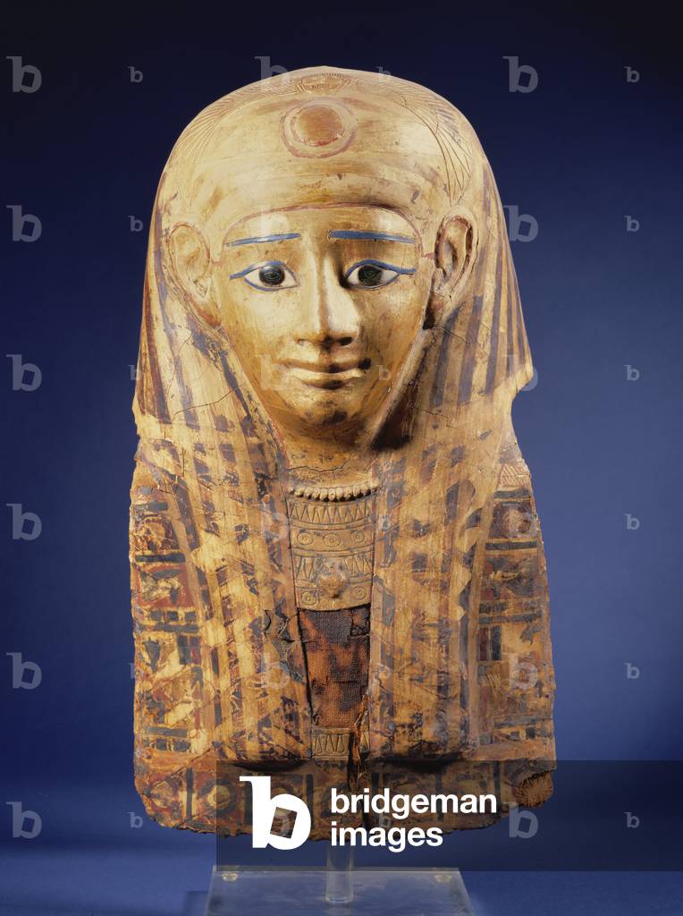 Cartonnage mummy head-dress with lappet wig, the eyes inlaid with obsidian and alabaster, Egyptian, Late Period (644-332 BC)