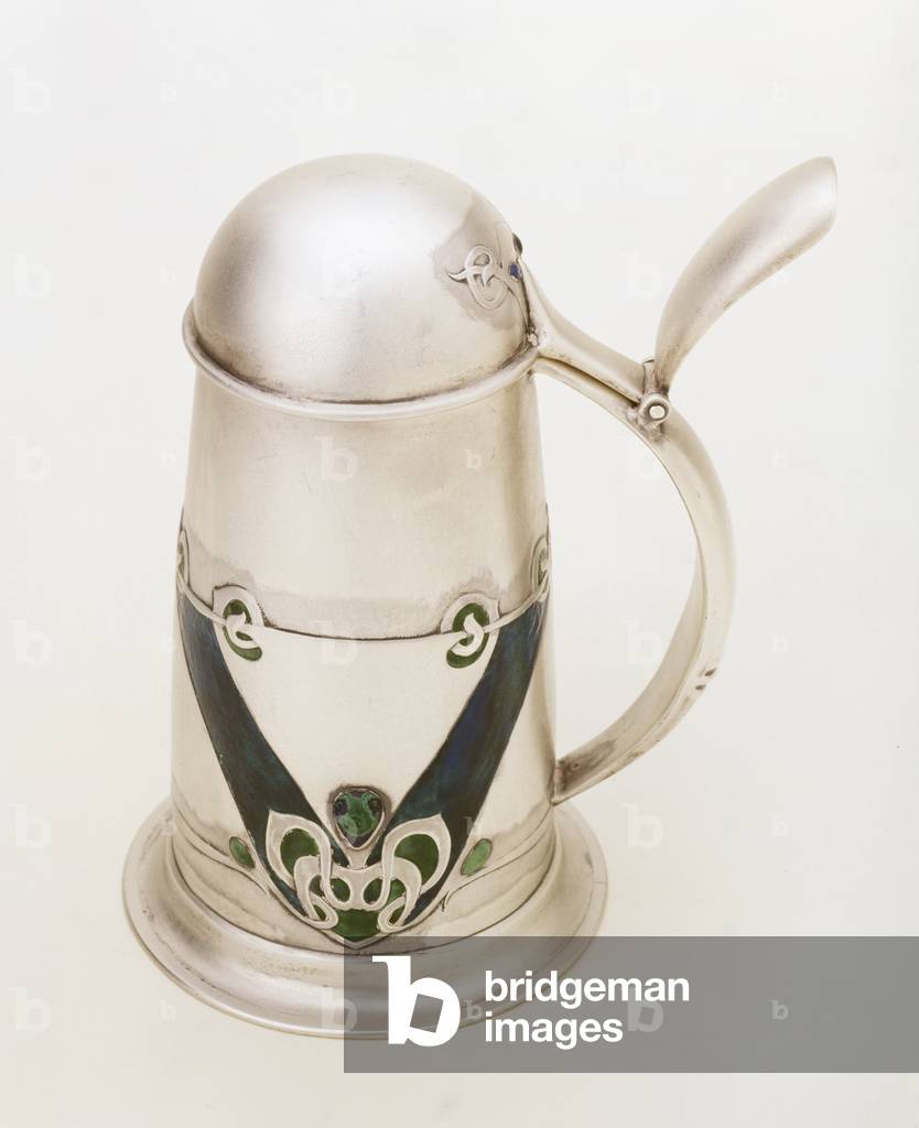 A Liberty and Co. silver and enamel lidded tankard by Archibold Knox, 1900