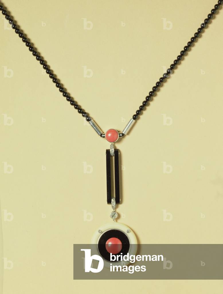 Art Deco pendant, c.1925 (ivory, onyx, & coral, inset with diamonds)
