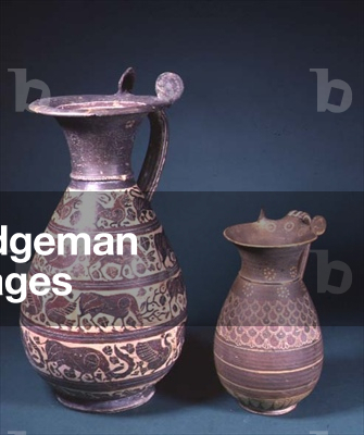 LtoR: Olpe, the body decorated with five registers of animals, Etrusco-Corinthian, c. 600 BC; olpe decorated with encircling bands and scale decoration, Corinthian, c. 600 BC