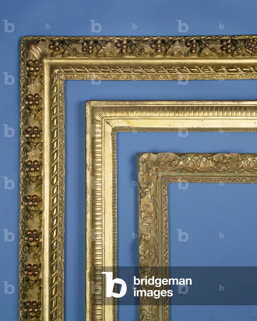 Three French carved and gilded frames: Louis XIII frame with running leaf and acorn carving, ropetwist and an embellished ogee sight edge; Louis XVI hollow frame with a fluted centre, palmette corners and a tongue sight carving; Louis XIV frame with foliate strapwork and anthemion cartouches, an ogee sight edge