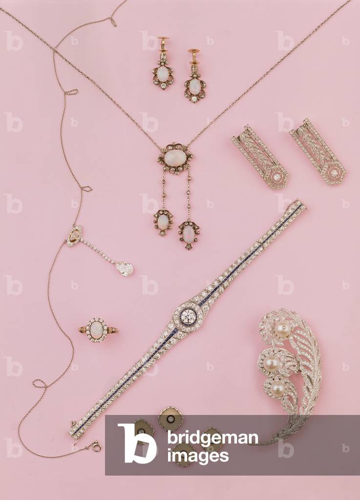 Selection of Edwardian and Art Deco jewellery: opal earrings and pendant; diamond neglige pendant; ostrich plume brooch; diamond and onyx cufflinks and studs