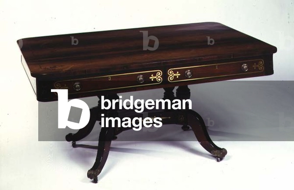 Regency rosewood and brass inlaid library table