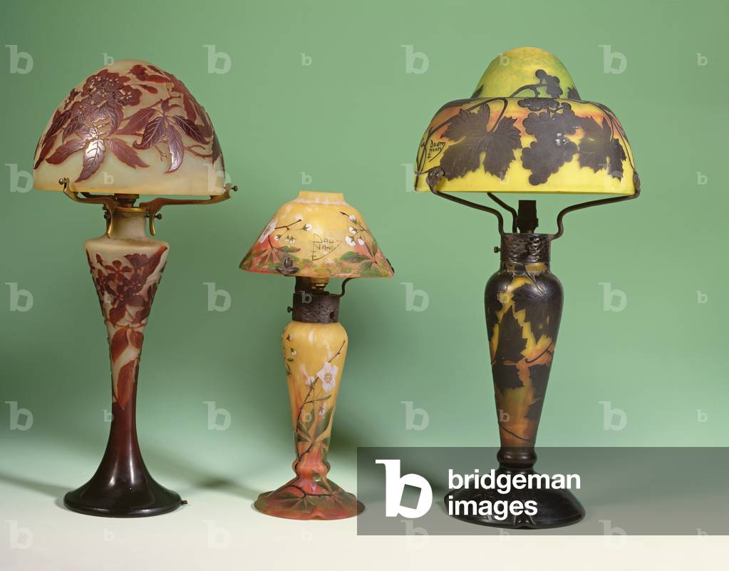 Three etched and enamelled glass table lamps by Auguste Daum (1853-1909), Nancy