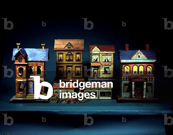 Four Two-Storey Doll's Houses - L-R: Gottschalk Blue Roof Doll's House, c. 1910; Bliss Doll's House 'Mrs Crackerjack', c.1910; Bliss Doll's House, c.1910; Bliss Doll's House, c.1920 (mixed media on wood)