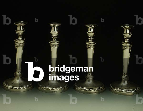 Four George III table candlesticks