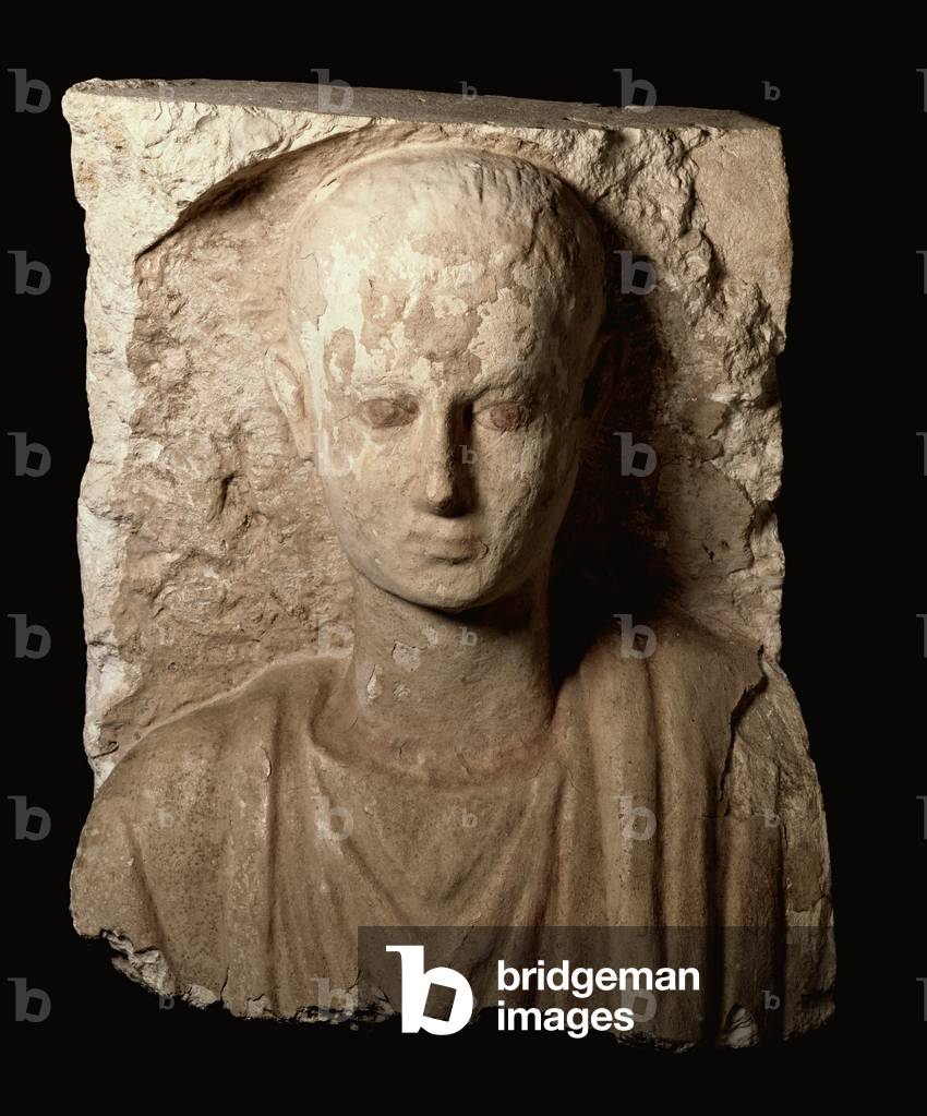 Fragment from a monument carved with the upper torso of a young boy, Coptic Period, c.300 AD (limestone)