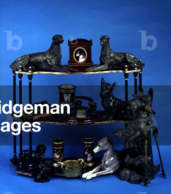 A collection of cold-cast resin and porcelain models of dogs, including works by Eve Pearce and Carolyn Sheffield (ceramic)