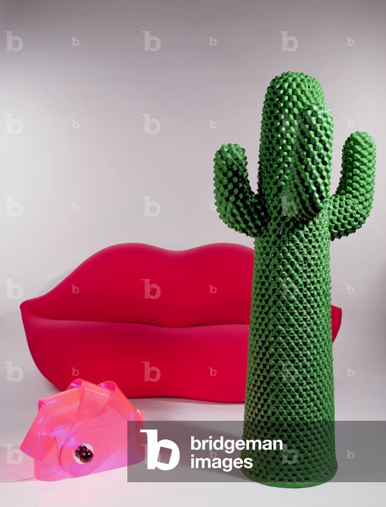 Cactus coat rack, designed by Guido Drocco and Franco Mello of 'Studio 65', 1972 (painted polyurethane foam), 'Bocca' sofa designed by 'Studio 65', 1972 and 'Gherpe' Shrimp light designed by 'Superstudio' (plastic)