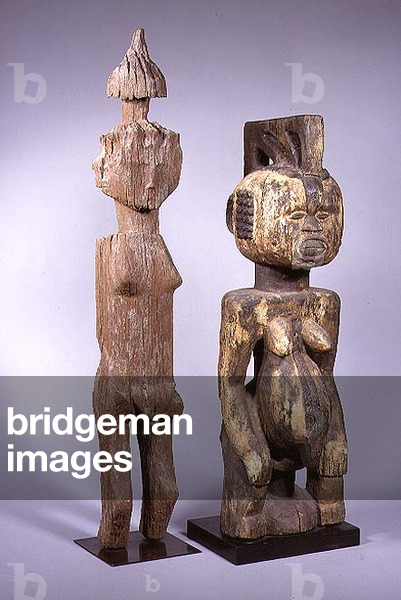LtoR: female figurine from the Sakalava tribe of Madagascar; female 'ekwot ame' figurine from the Idoma tribe of Nigeria, Africa (wood)