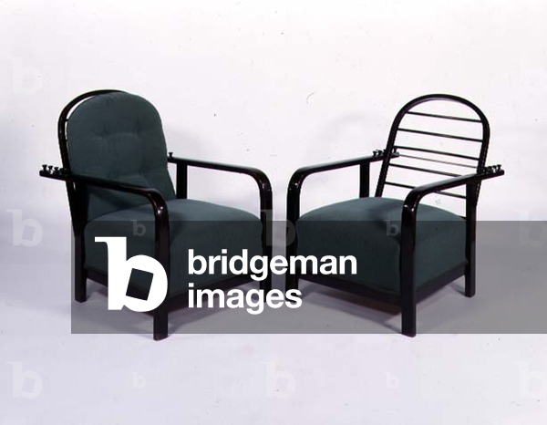 Green upholstered reclining armchairs in the manner of Josef Hoffmann (1870-1956), (wood)