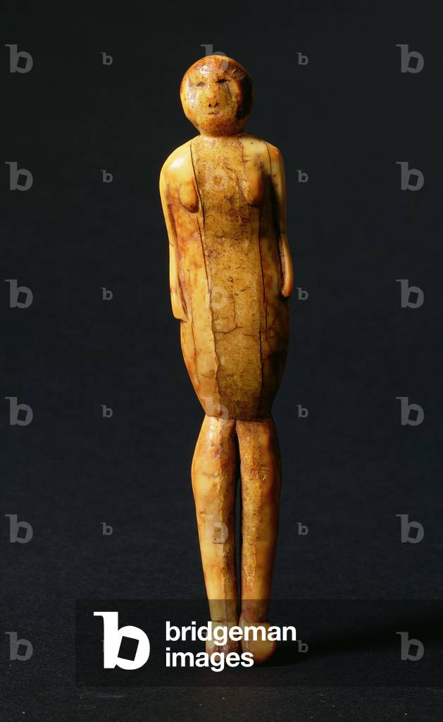 Mainland Eskimo female figurine with rounded abdomen and nubbin breasts, Thule period, c.8th century (ivory)