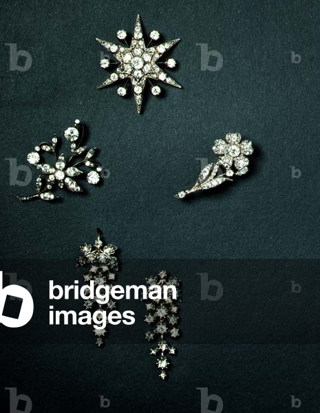 Selection of diamond brooches and earrings