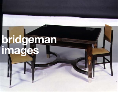 Austrian Macassar draw-leaf, inlaid table (ebony with white metal mounts) and Side Chairs in the manner of Josef Hoffmann (1870-1956) (darkwood frames with white metal sabots feet)