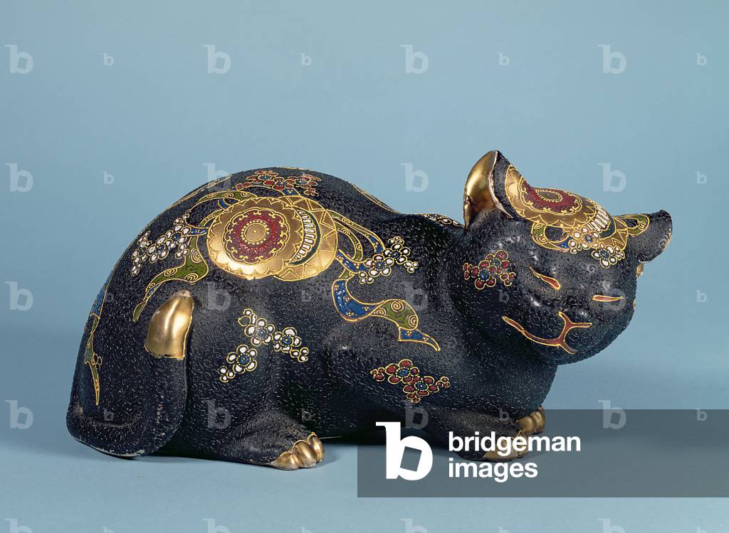 A Satsuma style stoneware figure of a recumbent cat decorated in colours and gilt, Showa period (1926-89)