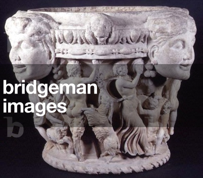 Carved column capital depicting Pan teasing a goat with a bunch of grapes and a maenad beating time with a tambourine, the rim decorated with heads of Dionysus and satyrs, Italian, from Rome, c.180-220 (marble, pentelic Greek of Italian Carrera) (see also 83317, 83319 for detail and 83320-21)