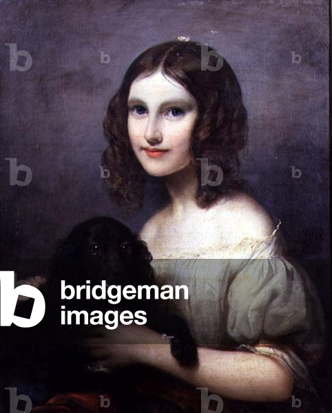 Portrait of a young girl with her pet dog