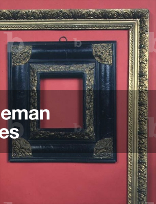 Louis XIII carved oak and ebonised frame, the cushion and chamfered profile with applied repousse brasswork, French or Flemish; French Louis XIII carved and gilded frame with a running leaf carving, scotia and a foliate sight edge