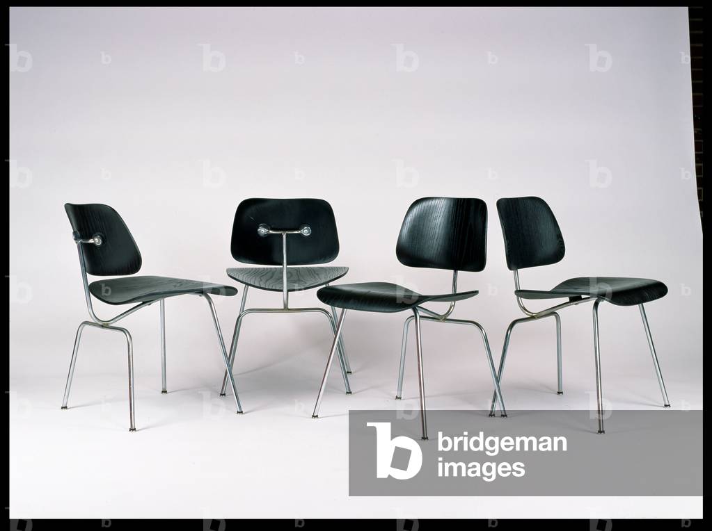 A Set of Four DCMs (Dining Chair Metal), designed by Charles Eames (1907-70), 1946-1960s (plywood with black aniline finish)