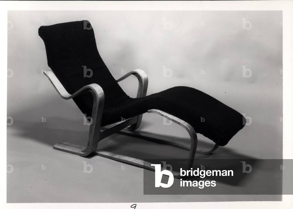 Isokon Long Chair with an upholstered cushion, designed for the Isokon Furniture Company by Marcel Breuer (1902-81) 1935-6 (laminated birch plywood) (b/w photo)