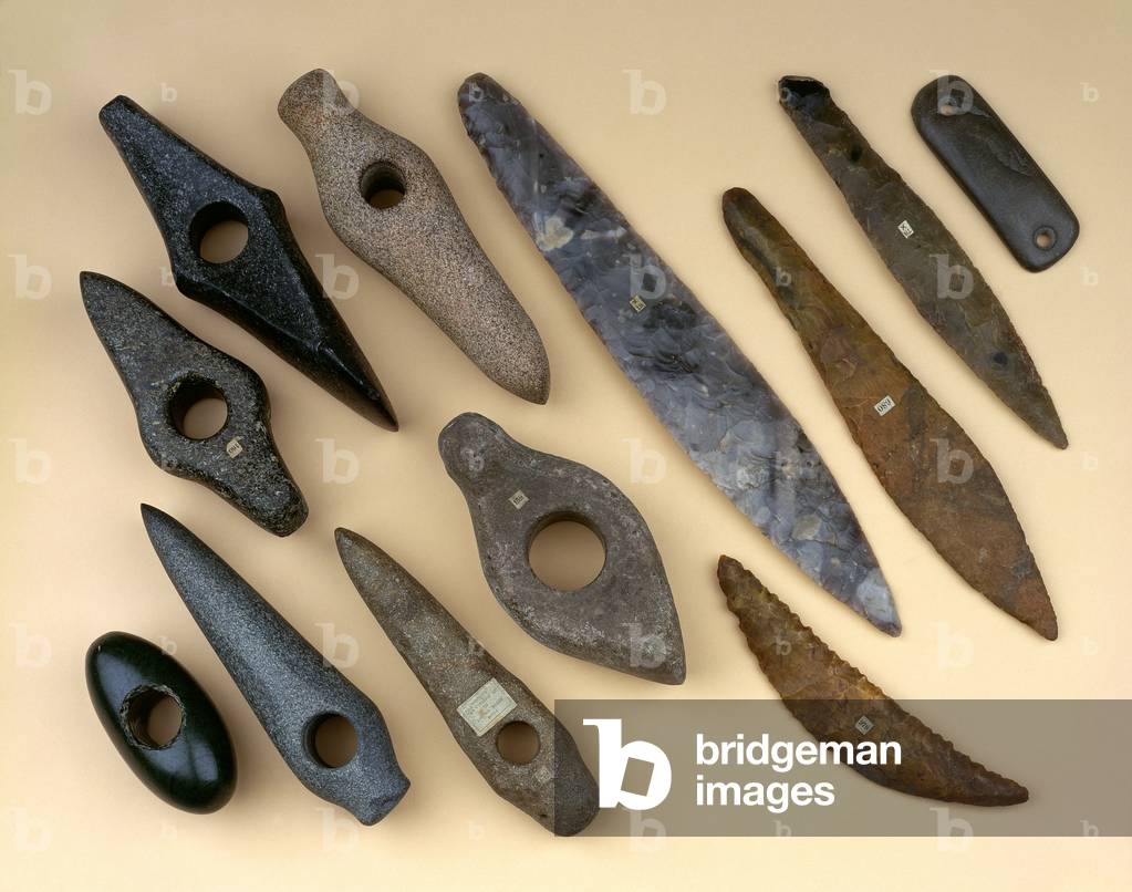 Collection of Neolithic to early Bronze Age weapon heads including a Danish flint leaf-shaped dagger and black stone battle axe and a Scandinavian stone macehead, 2500-1000 BC (flint, stone)