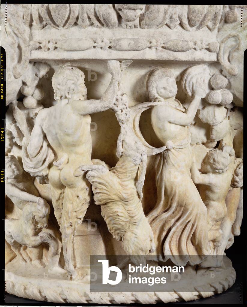Carved column capital depicting Pan teasing a rearing goat with a bunch of grapes and a maenad beating time with a tambourine, Italian, from Rome, c.180-220 (marble, pentelic Greek or Italian Carrera) (detail of 83318, see also 83317 and 83320-21)