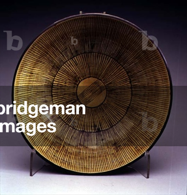 A yellow stoneware bowl (ceramic)