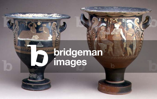 Two Campanian red-figure bell kraters depicting (L) two reclining males (R) standing female flanked by two warriors, attributed to the CA Painter, Greek, from Southern Italy, c.340 BC (pottery)
