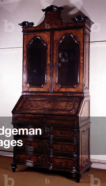 A North Italian burr walnut bureau cabinet with ebonised mouldings, early 18th century