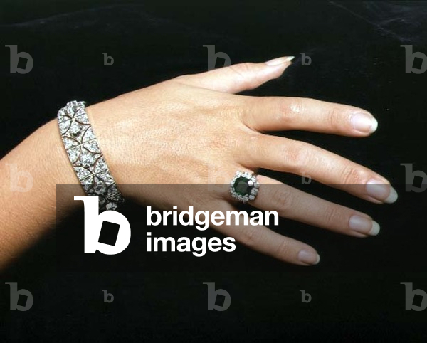 Antique diamond bracelet and step cut emerald and diamond cluster ring