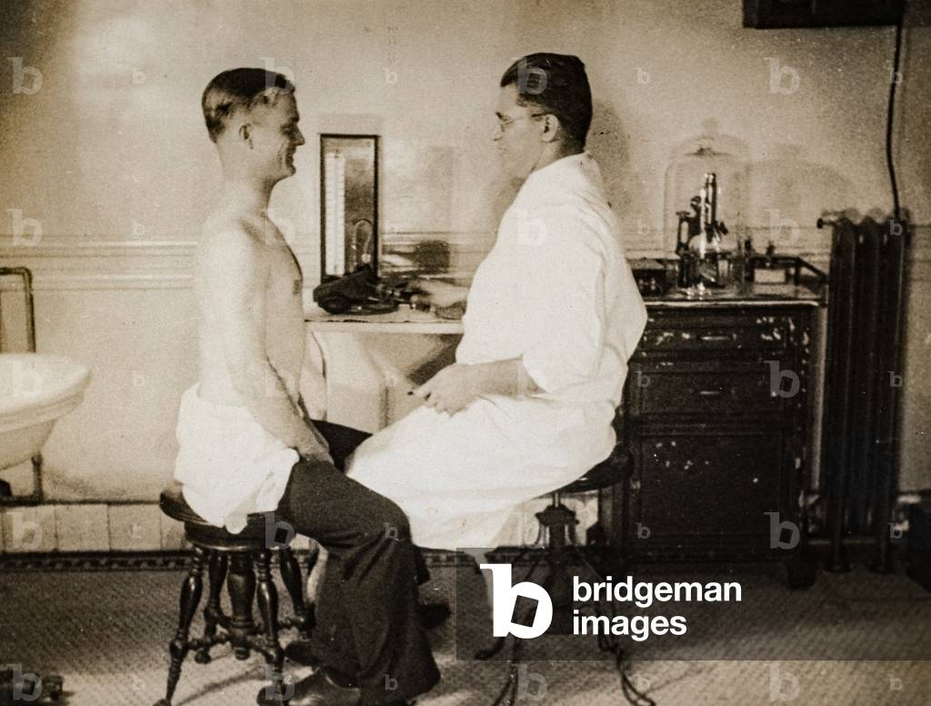 Doctor Examines Patient, c.1925 (silver gelatin print)