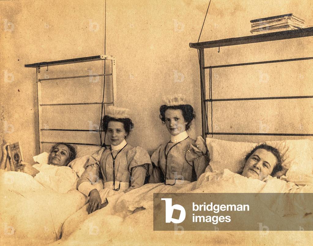 Nurses Attending to Patients #2 (silver gelatin print)