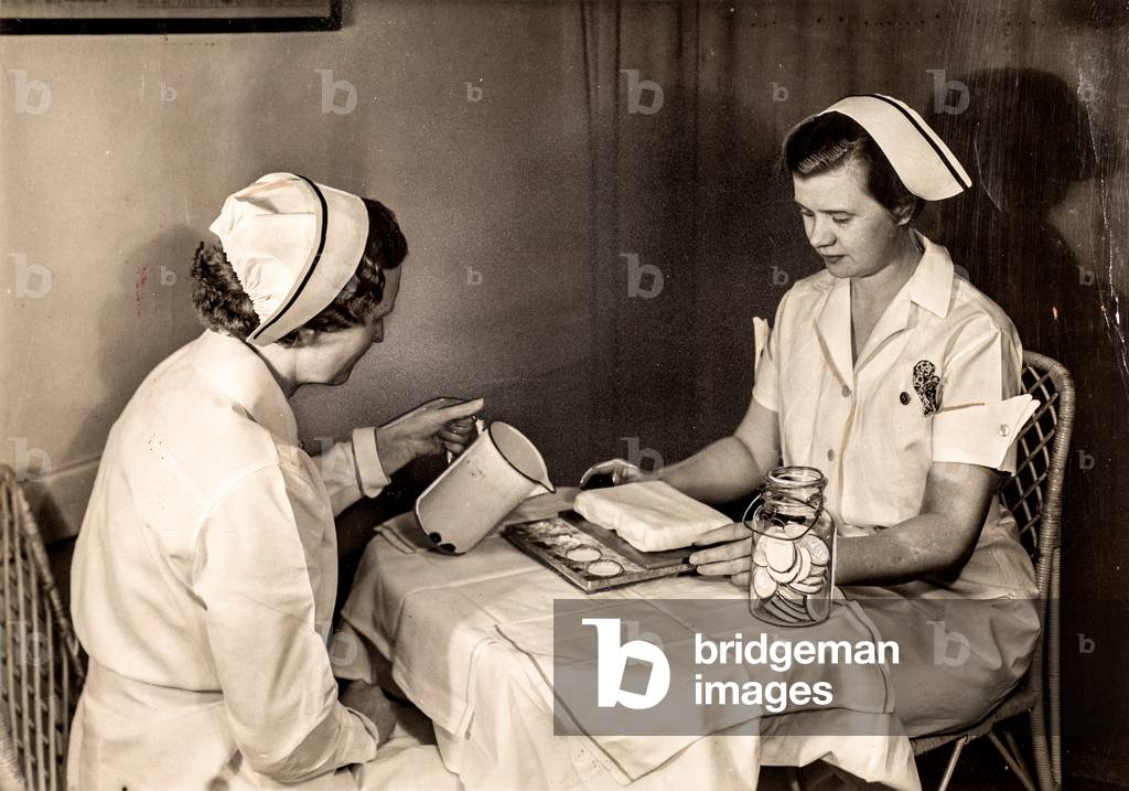 Wet Nurses Freezing Breast Milk into Molds, USA, 1936 (silver gelatin print)
