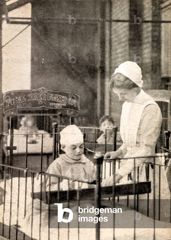 Nurse and patients at the Queen’s Hospital for Children, London, England, UK, c.1905 (postcard)